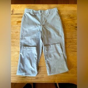Under Armour Golf Pants Size 14. Used. Good overall condition.